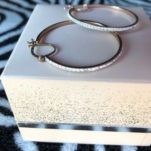 Women’s hoop diamond earrings